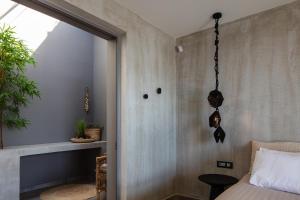 Postel nebo postele na pokoji v ubytování Kumo Villas