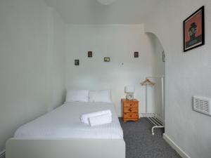 Ένα ή περισσότερα κρεβάτια σε δωμάτιο στο Pass the Keys Colourful property sleeps 6