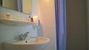 Koupelna v ubytování Hôtel Compostelle