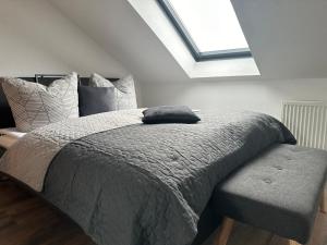 Postel nebo postele na pokoji v ubytování Ferienwohnung Zeitz - Weiße Elster Apartment