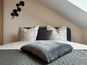 Postel nebo postele na pokoji v ubytování Ferienwohnung Zeitz - Weiße Elster Apartment