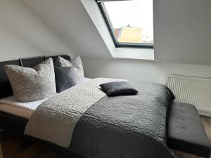Postel nebo postele na pokoji v ubytování Ferienwohnung Zeitz - Weiße Elster Apartment