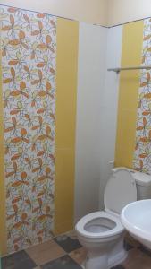 Kylpyhuone majoituspaikassa Wansiri Mansion