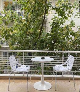 A balcony or terrace at Estia Boutique Apartment