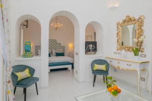 Postel nebo postele na pokoji v ubytování Milky Suites Positano