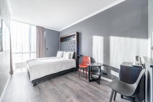 Postel nebo postele na pokoji v ubytování Hotel Aska