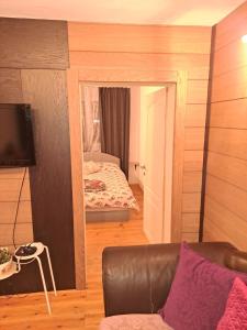 Postel nebo postele na pokoji v ubytování Kućerak Sofija