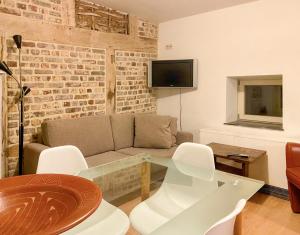 Μια τηλεόραση ή/και κέντρο ψυχαγωγίας στο Lovely appartment in Voeren