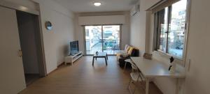TV a/nebo společenská místnost v ubytování Mimosa flat City Cente 2bdr