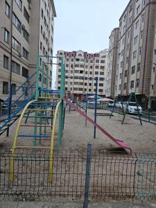 a playground in the middle of a city at Bonushka 5 in Uzbankinty