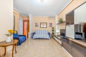 Telewizja i/lub zestaw kina domowego w obiekcie Sunflower Alhambra