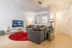 A television and/or entertainment centre at Royal Palace by SkyKey