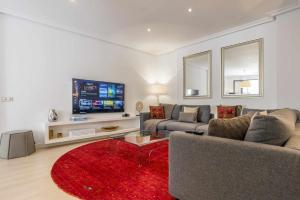 A television and/or entertainment centre at Royal Palace by SkyKey