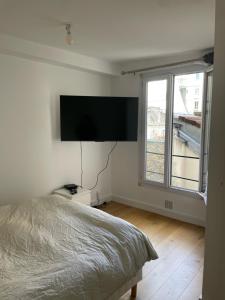 Élégant appartement Paris 6ème 객실 침대