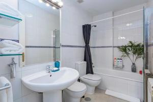 A bathroom at Royal Palace by SkyKey