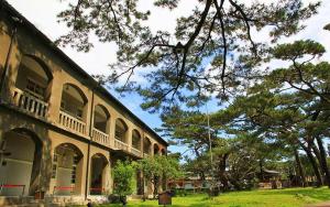 a large building with trees in front of it at 500Km Home in Hualien City