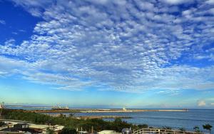 a cloudy sky over a body of water at 500Km Home in Hualien City