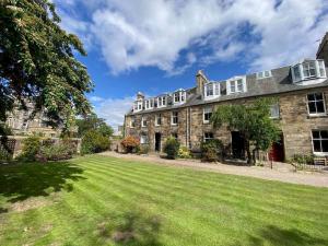Casa de piedra grande con patio grande en Abbotsford Place - Sleeps 6 - Parking en St Andrews