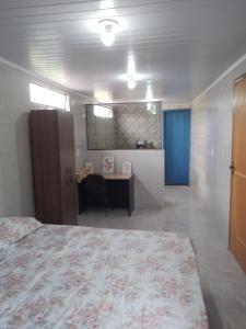 Cama o camas de una habitación en Acomodação com frigobar,wifi,Tv