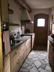 A kitchen or kitchenette at Chalet Teo e Marianna