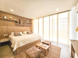 Postel nebo postele na pokoji v ubytování Apartamento en Morros Zoe con acceso directo al mar en Cartagena + 45 fotografií