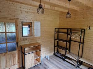 Palanda nebo palandy na pokoji v ubytování Chaty u lesa