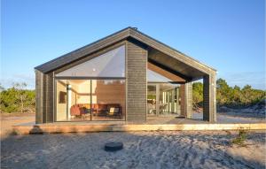 a glass house on the beach at 3 Bedroom Lovely Home In Anholt in Anholt
