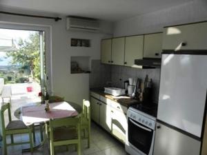 Kuchyňa alebo kuchynka v ubytovaní Apartments Jaca