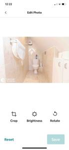 a bathroom with a toilet and a sink at Studio flat in the heart of Golders Green in London