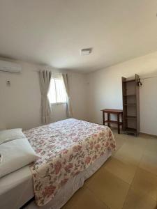Cama o camas de una habitación en URUAÚ BEACH RESIDENCE