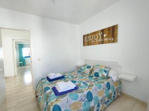 Łóżko lub łóżka w pokoju w obiekcie Villa Rubicón Costa