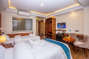 Voodi või voodid majutusasutuse Darbar Heritage Inn toas