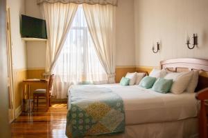 Postel nebo postele na pokoji v ubytování Hotel Di Torlaschi