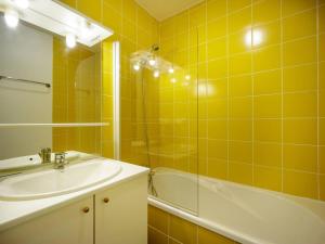Kúpeľňa v ubytovaní Grand appartement 12 pers. à Peyragudes avec balcon - FR-1-695-8