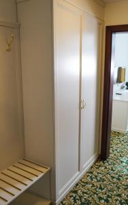 a room with a closet and a door at EA Hotel Elefant in Karlovy Vary