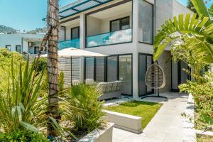 an image of a house with a garden at Yalikavak Twin Villa in Bodrum City