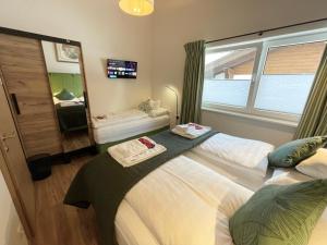 Letto o letti in una camera di Apart 7 Stuben