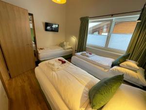 Letto o letti in una camera di Apart 7 Stuben