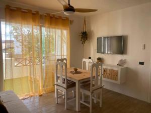 TV a/nebo společenská místnost v ubytování Portitxol apartamento reformado a estrenar + 6 fotografií