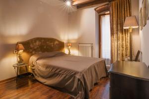 Ένα ή περισσότερα κρεβάτια σε δωμάτιο στο Napule...è apartments +37 φωτογραφίες