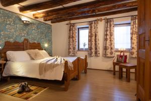 Postel nebo postele na pokoji v ubytování Chalet d'Aoste