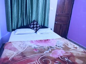 מיטה או מיטות בחדר ב-Beach Shalom Luxry Apartment and Villa Colva