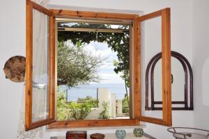 a window in a room with a view at Finestra sul mare in Cala Gonone