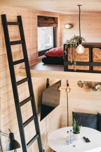 Postel nebo postele na pokoji v ubytování Idyllisches Tiny House III mit Sauna