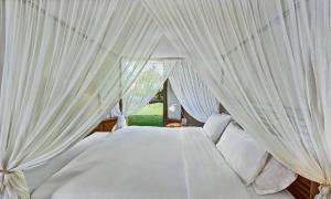 Posteľ alebo postele v izbe v ubytovaní Villa Veneziano Suites & Villa
