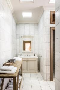 חדר רחצה ב-Villa Veneziano Suites & Villa