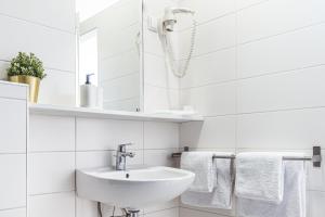 Ein Badezimmer in der Unterkunft National Plus
