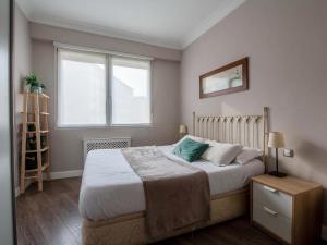 Postel nebo postele na pokoji v ubytování Bilbao San Mamés by Aston Rentals
