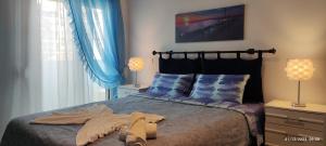เตียงในห้องที่ Delphitea Philoxenia