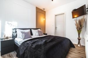 Ein Bett oder Betten in einem Zimmer der Unterkunft National Plus